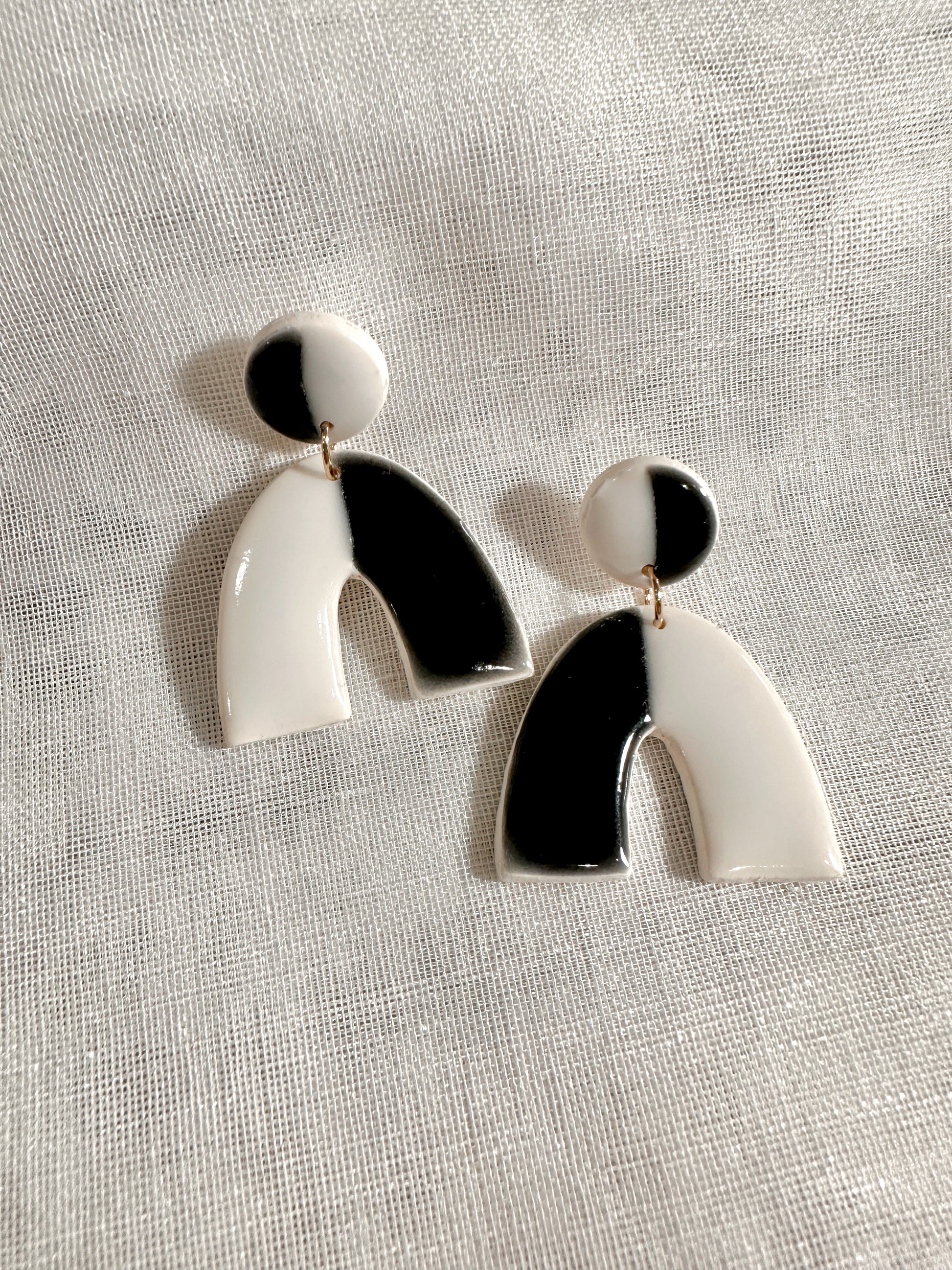 faux ceramic black and white deco arches handmade earrings top down