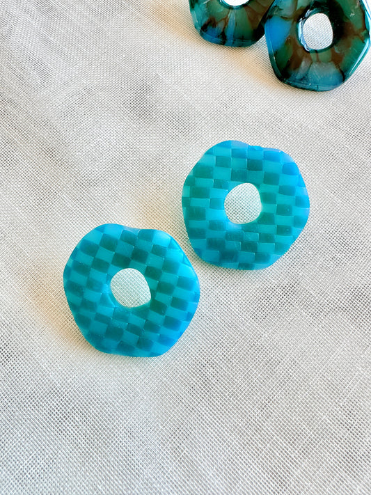 Teal Checkered Donut Posts